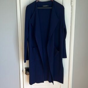 Blue cardigan with front pockets.  Size L